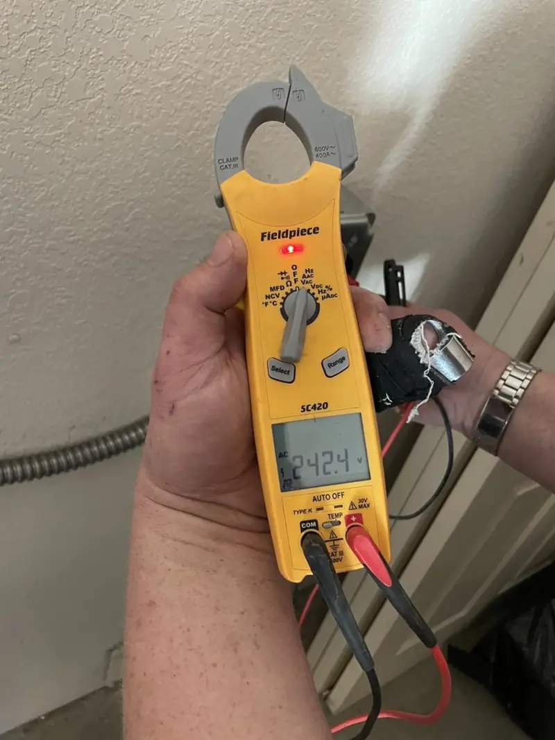 Voltage testing with clamp meter during Generator Installation in Wilsonville